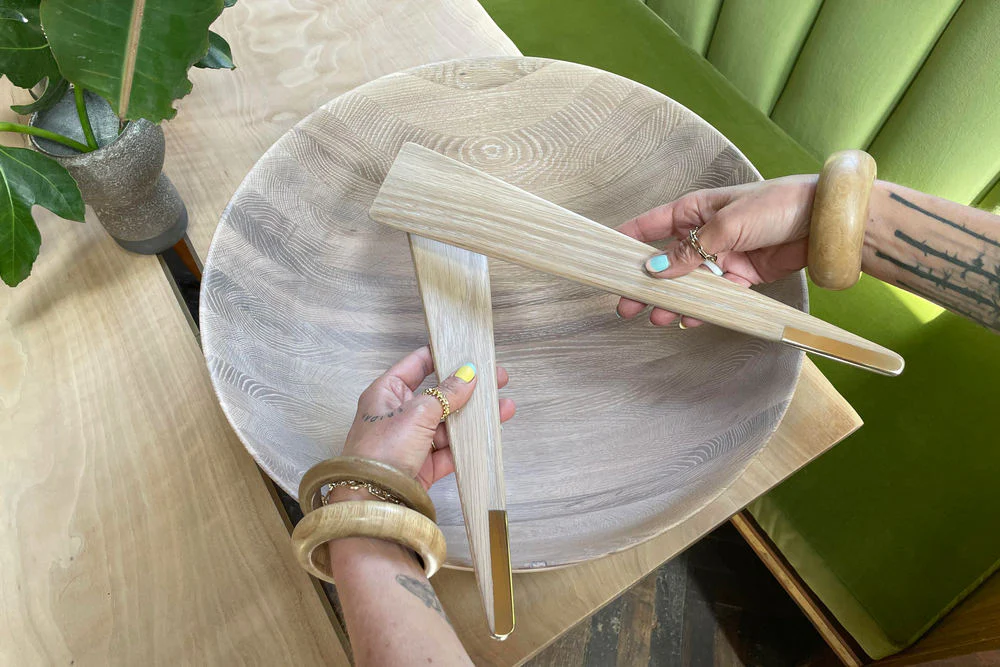 Salad Servers photographed in warm wooden kitchen styling